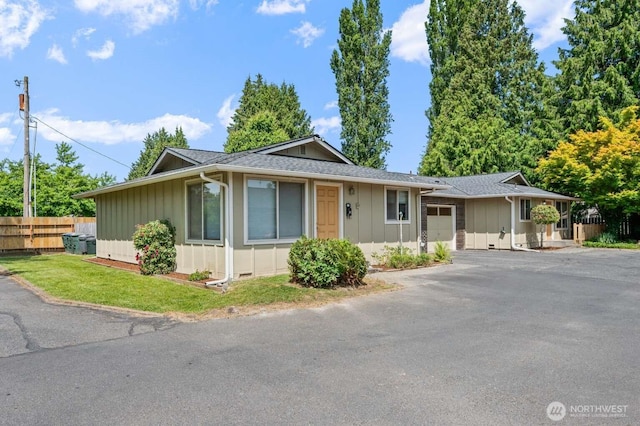 1202 Nelson St, Sedro Woolley, WA 98284 - single story home with board and batten siding, a garage, driveway, and roof with shingles