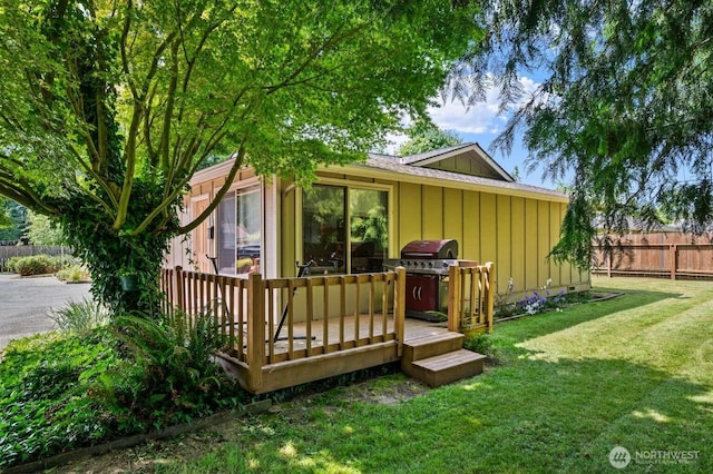 1202 Nelson St, Sedro Woolley, WA 98284 - rear view of house with board and batten siding and a deck