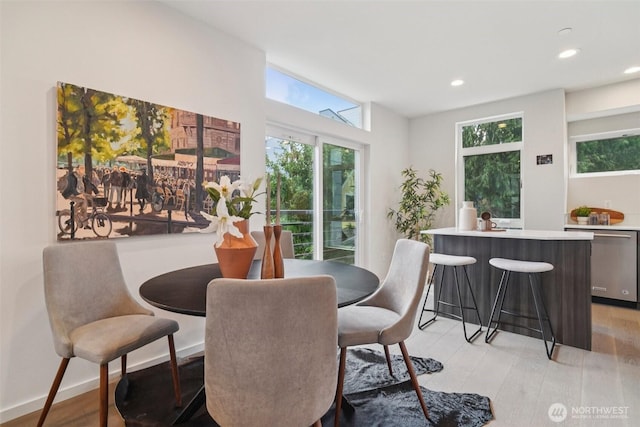 9032 14th Ave NW Unit D, Seattle, WA 98117 - dining area with healthy amount of natural light, recessed lighting, and light wood-style flooring