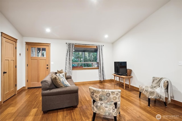 11211 Juniper Pl, Anderson Island, WA 98303 - living room with lofted ceiling, wood finished floors, and recessed lighting