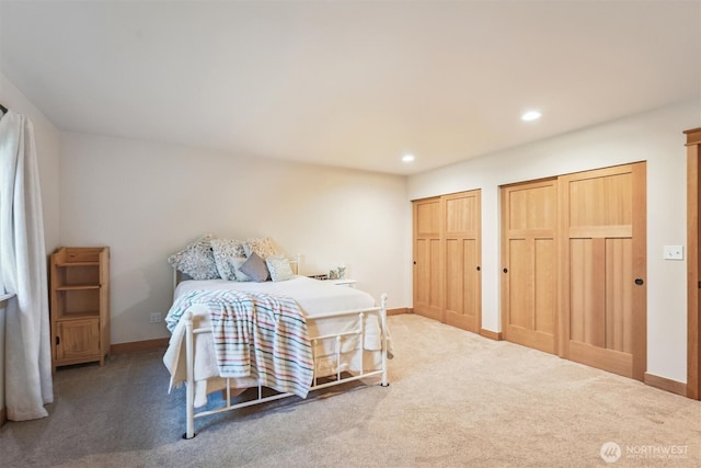 11211 Juniper Pl, Anderson Island, WA 98303 - bedroom with two closets, carpet, and recessed lighting