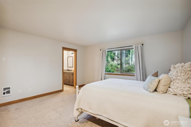 11211 Juniper Pl, Anderson Island, WA 98303 - bedroom with heating unit, light carpet, and ensuite bath
