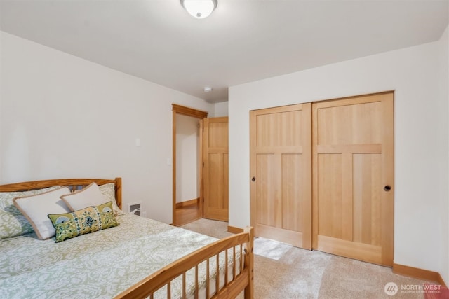 11211 Juniper Pl, Anderson Island, WA 98303 - bedroom with light carpet and a closet