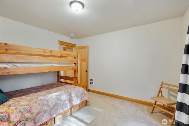 11211 Juniper Pl, Anderson Island, WA 98303 - carpeted bedroom featuring baseboards