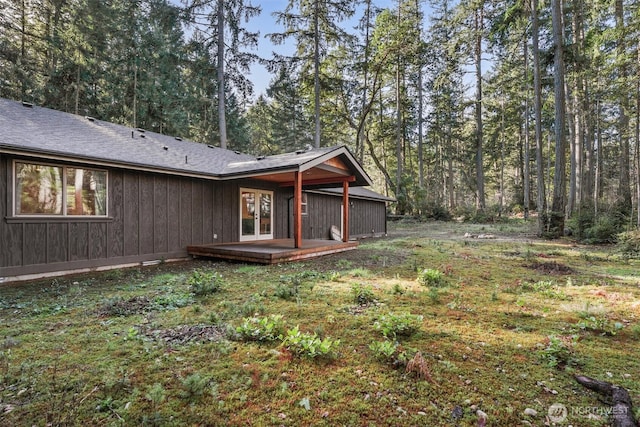 11211 Juniper Pl, Anderson Island, WA 98303 - back of house featuring a deck