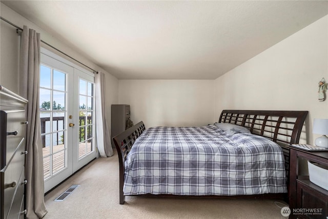 2505 211th Ave E, Lake Tapps, WA 98391 - carpeted bedroom featuring access to outside, french doors, and a water view