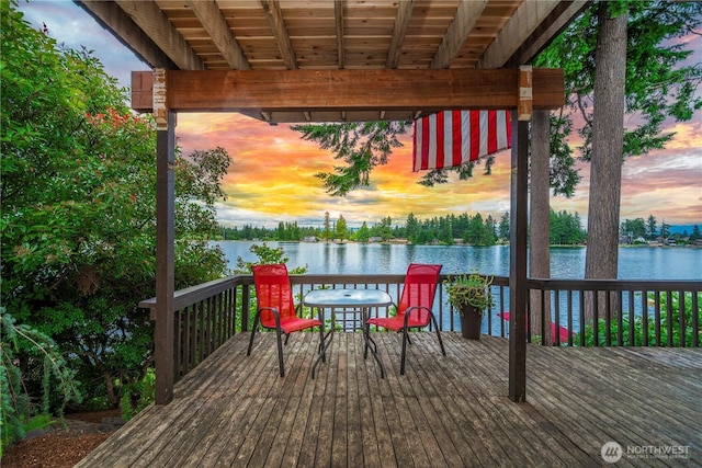 2505 211th Ave E, Lake Tapps, WA 98391 - deck at dusk featuring a water view
