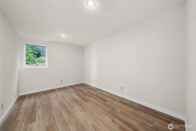 2505 211th Ave E, Lake Tapps, WA 98391 - empty room with light wood finished floors and recessed lighting