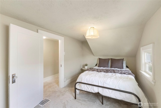 1206 S 14th St, Tacoma, WA 98405 - carpeted bedroom featuring a textured ceiling and vaulted ceiling