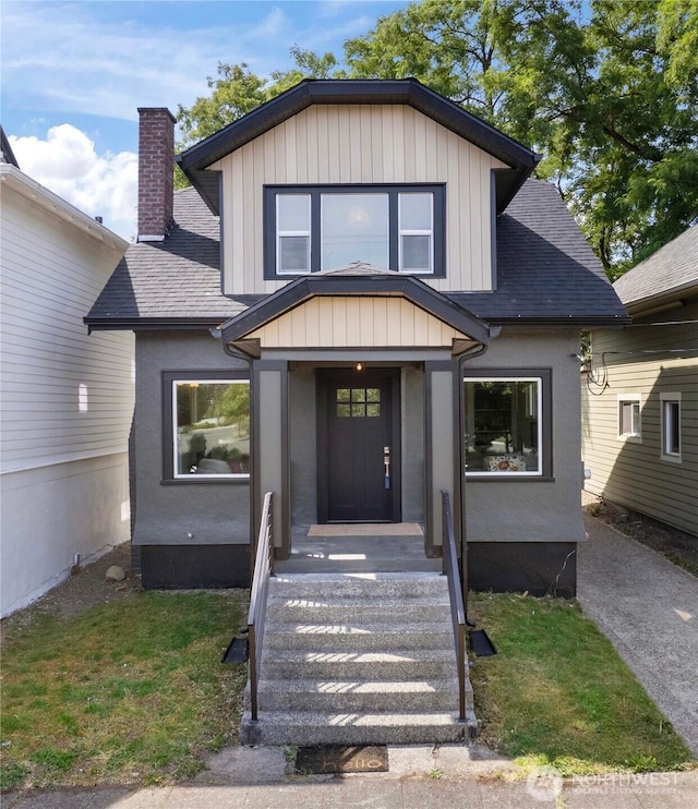 1206 S 14th St, Tacoma, WA 98405 - view of front of home featuring roof with shingles and a chimney
