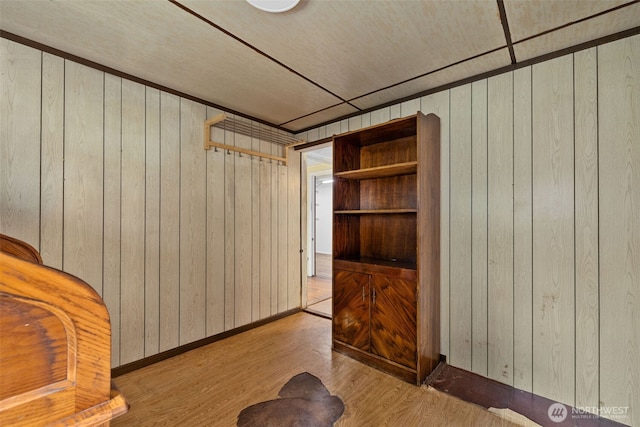 429 170th St S, Spanaway, WA 98387 - unfurnished room with wood walls and wood finished floors