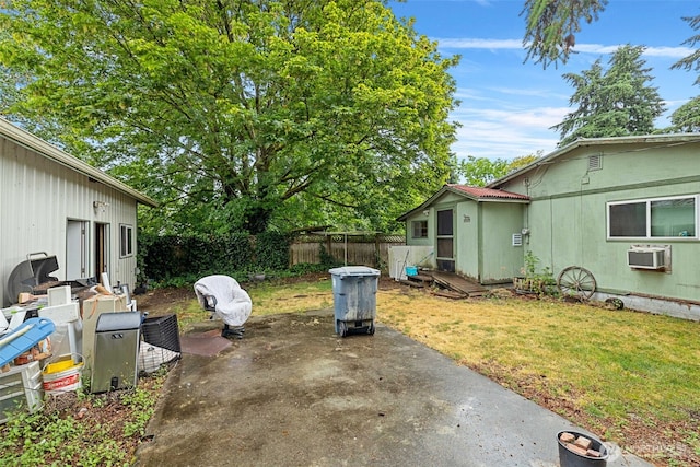 429 170th St S, Spanaway, WA 98387 - view of yard featuring a patio, an outbuilding, and an AC wall unit