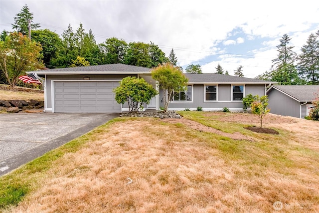 13457 SE Fairwood Blvd, Renton, WA 98058 - ranch-style home featuring asphalt driveway, an attached garage, and a front yard