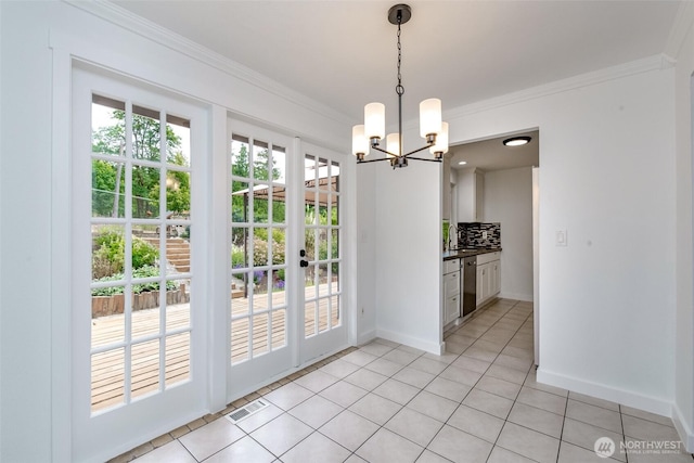 13457 SE Fairwood Blvd, Renton, WA 98058 - unfurnished dining area featuring light tile patterned flooring, crown molding, and a chandelier