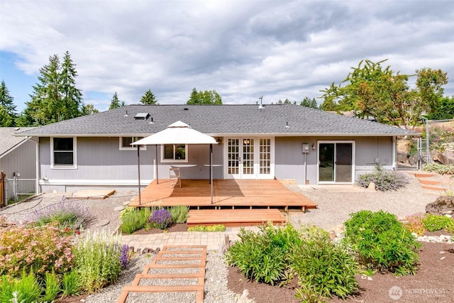13457 SE Fairwood Blvd, Renton, WA 98058 - back of property with french doors, a wooden deck, and roof with shingles