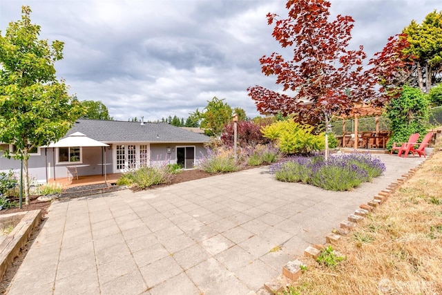 13457 SE Fairwood Blvd, Renton, WA 98058 - rear view of house with a patio and french doors