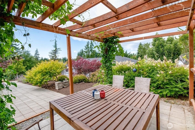 13457 SE Fairwood Blvd, Renton, WA 98058 - view of patio / terrace with outdoor dining area and a pergola