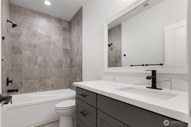 14317 Mima Rd SW, Olympia, WA 98512 - bathroom featuring vanity, washtub / shower combination, and recessed lighting