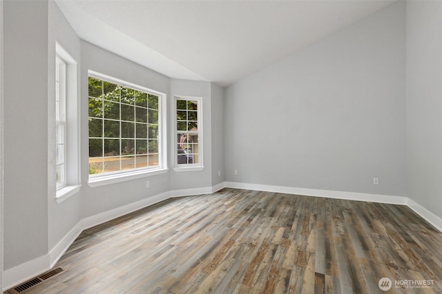22415 Bluewater Dr SE, Yelm, WA 98597 - spare room with wood finished floors and baseboards