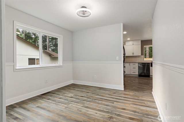 22415 Bluewater Dr SE, Yelm, WA 98597 - empty room featuring wood finished floors and recessed lighting
