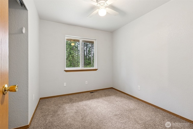 22415 Bluewater Dr SE, Yelm, WA 98597 - carpeted empty room featuring ceiling fan and baseboards