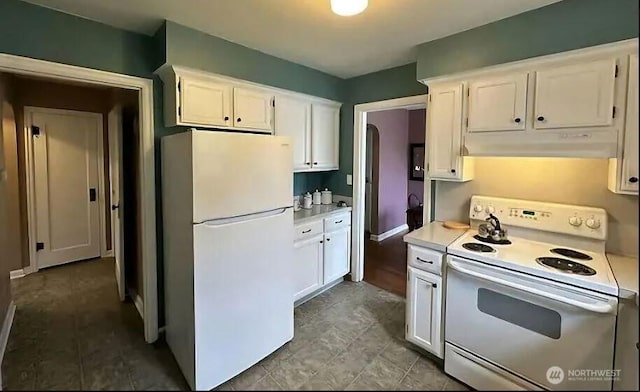302 S Albert St, Port Angeles, WA 98362 - kitchen with white appliances, light countertops, white cabinetry, and under cabinet range hood