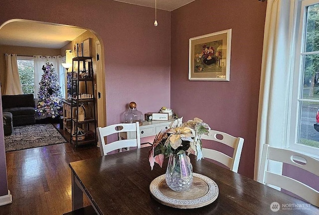 302 S Albert St, Port Angeles, WA 98362 - dining room featuring arched walkways and wood finished floors