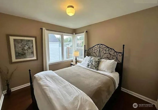 302 S Albert St, Port Angeles, WA 98362 - bedroom with baseboards and dark wood finished floors