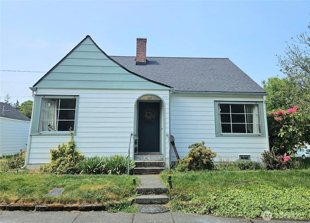 302 S Albert St, Port Angeles, WA 98362 - view of front facade featuring a chimney, a shingled roof, and entry steps