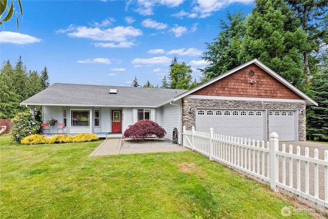 8615 176th St NW, Stanwood, WA 98282 - ranch-style home featuring an attached garage, driveway, a porch, and stone siding