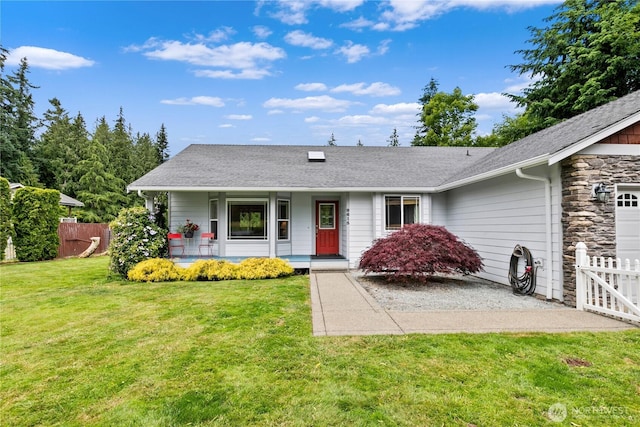 8615 176th St NW, Stanwood, WA 98282 - view of front facade featuring a porch, stone siding, an attached garage, and a shingled roof