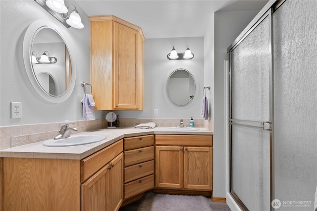8615 176th St NW, Stanwood, WA 98282 - bathroom with double vanity and a shower stall