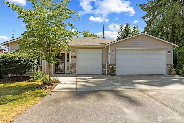 16314 2nd Dr SE, Bothell, WA 98012 - view of front of property featuring driveway, an attached garage, and brick siding