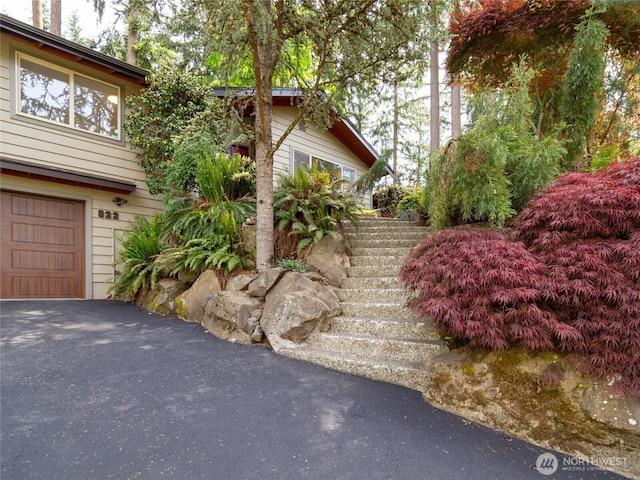 822 206th Ave NE, Sammamish, WA 98074 - view of side of home featuring stairs