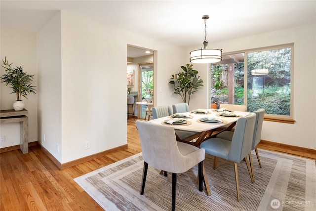 822 206th Ave NE, Sammamish, WA 98074 - dining room with baseboards and light wood-style floors