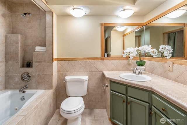 822 206th Ave NE, Sammamish, WA 98074 - full bath featuring vanity, tile patterned floors, tile walls, and a combined bath / shower with jetted tub