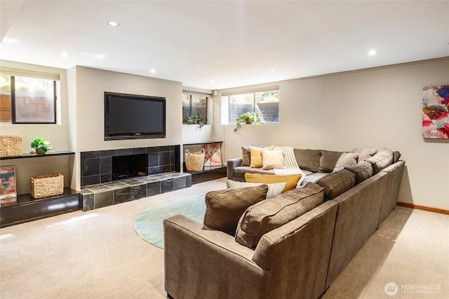822 206th Ave NE, Sammamish, WA 98074 - living room featuring light carpet, recessed lighting, and a tiled fireplace