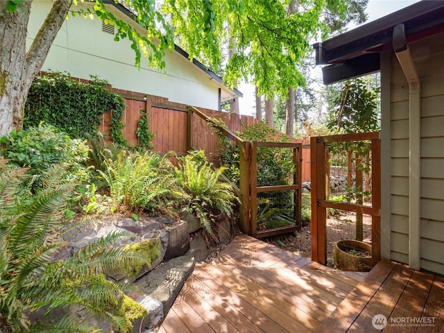 822 206th Ave NE, Sammamish, WA 98074 - wooden terrace featuring a gate