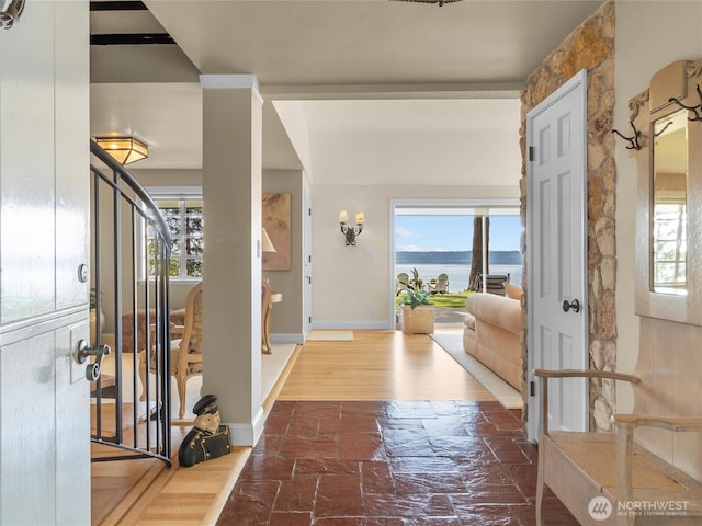 19263 Edgecliff Dr SW, Normandy Park, WA 98166 - foyer featuring stone finish flooring and a water view
