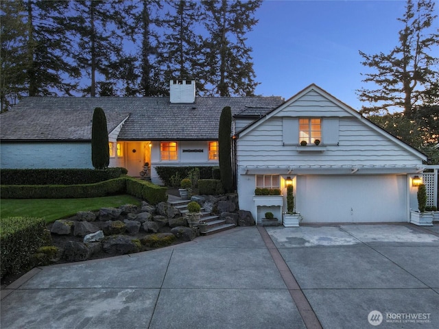 19263 Edgecliff Dr SW, Normandy Park, WA 98166 - view of front of property featuring a chimney, driveway, and a garage