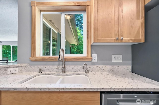 132 Tanglewood Dr, Longview, WA 98632 - kitchen featuring dishwasher and light stone counters
