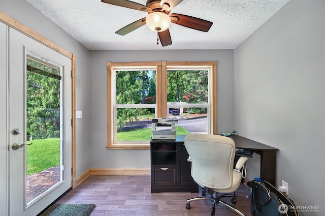 132 Tanglewood Dr, Longview, WA 98632 - office featuring wood finished floors, a textured ceiling, and a ceiling fan