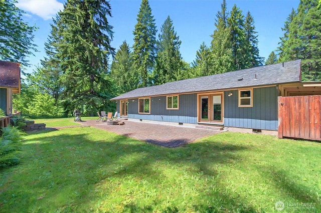 132 Tanglewood Dr, Longview, WA 98632 - rear view of property featuring crawl space, a yard, a patio, and a fire pit