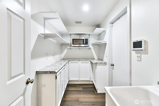 20 Cascade Ky, Bellevue, WA 98006 - walk in closet featuring dark wood finished floors