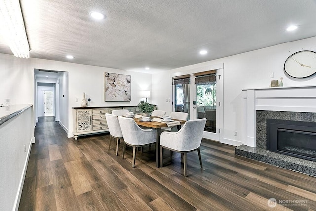 20 Cascade Ky, Bellevue, WA 98006 - dining room with dark wood finished floors, a textured ceiling, recessed lighting, and a premium fireplace