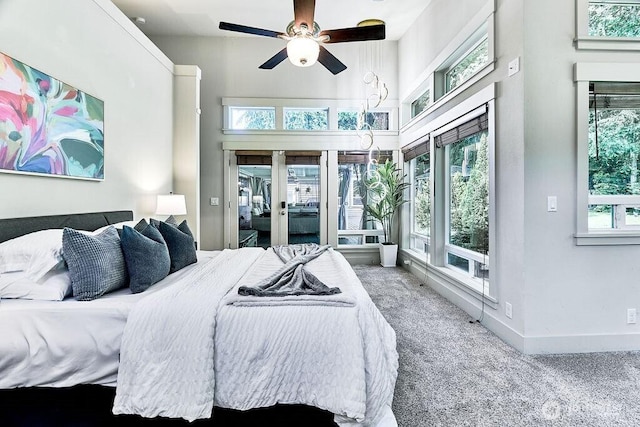 20 Cascade Ky, Bellevue, WA 98006 - bedroom featuring carpet, multiple windows, a towering ceiling, ceiling fan, and access to outside
