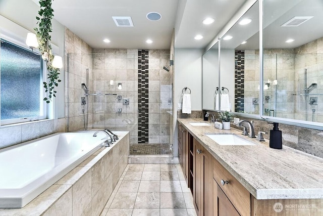 20 Cascade Ky, Bellevue, WA 98006 - bathroom featuring a shower stall, a bath, double vanity, recessed lighting, and tile patterned flooring