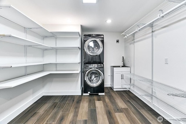 20 Cascade Ky, Bellevue, WA 98006 - laundry area featuring estacked washer and dryer, dark wood-style floors, recessed lighting, and cabinet space