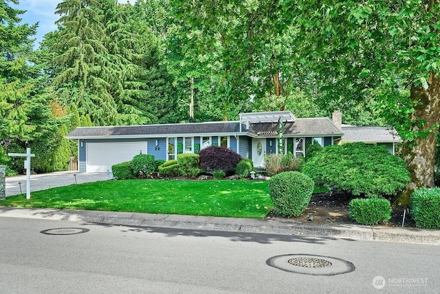 20 Cascade Ky, Bellevue, WA 98006 - view of front facade with concrete driveway, an attached garage, a front lawn, and a chimney