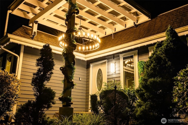 20 Cascade Ky, Bellevue, WA 98006 - exterior entry at twilight featuring a pergola